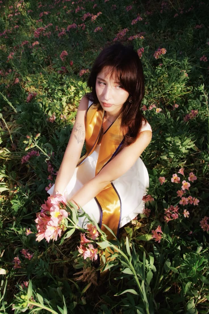 Graduate portrait in flower garden